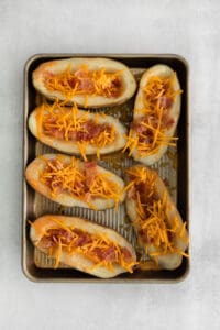 Potato skins with cheddar cheese and bacon.
