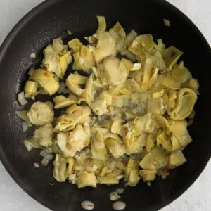 Artichokes in a skillet.