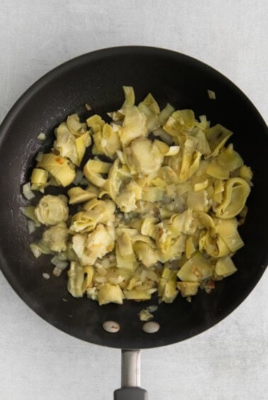 Artichokes in a skillet.
