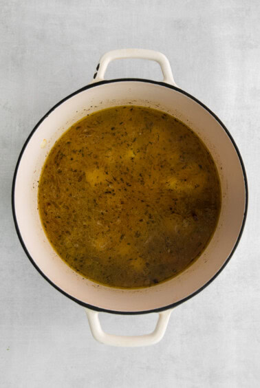 Simmering potatoes in the pot.