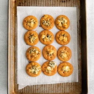 ritz crackers on baking sheet.