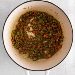 cooking veggies in pot.