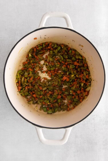 cooking veggies in pot.