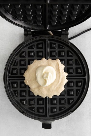 cooking waffles on waffle maker.