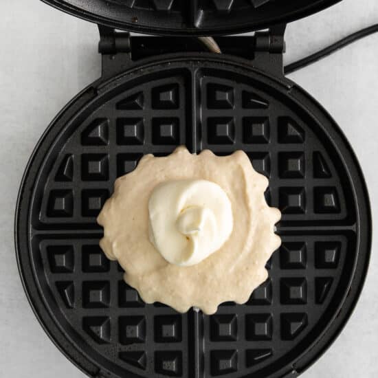 cooking waffles on waffle maker.