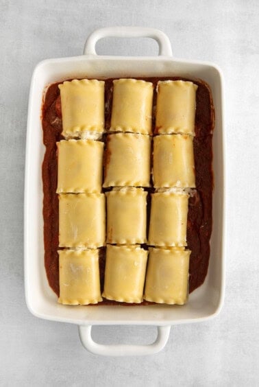 lasagna roll ups in casserole dish.