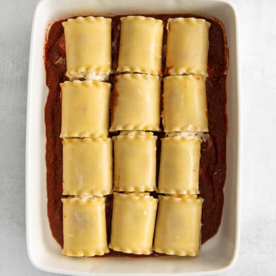 lasagna roll ups in casserole dish.