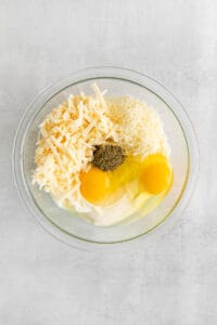 cheese and eggs in bowl.