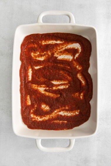 pizza sauce on casserole dish.