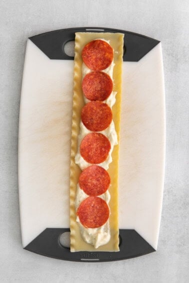 making lasagna roll up.