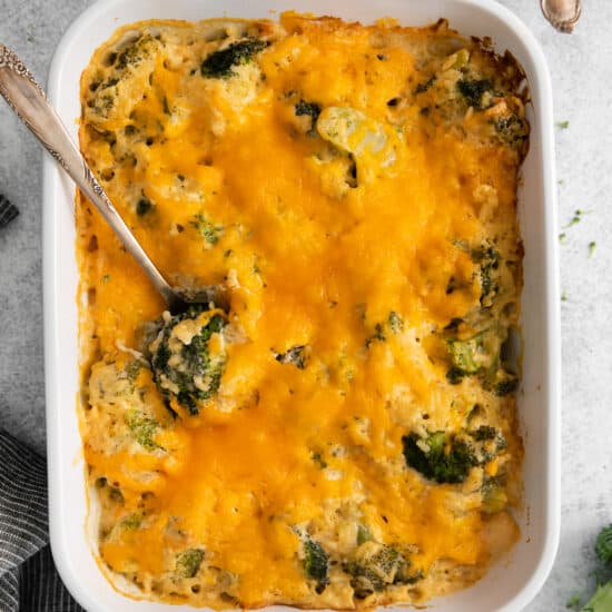 a casserole dish with broccoli and cheese.
