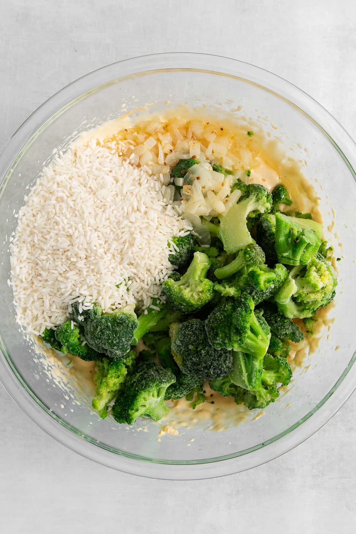Broccoli, cheese and rice in a bowl.