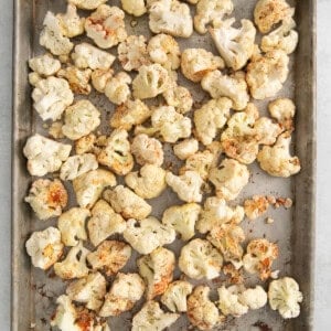 roasted cauliflower on a baking sheet.