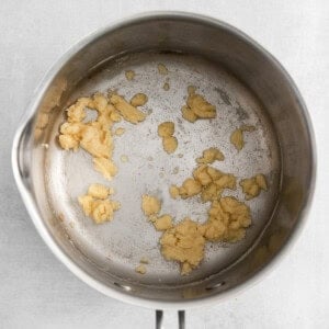 a frying pan with a piece of food in it.