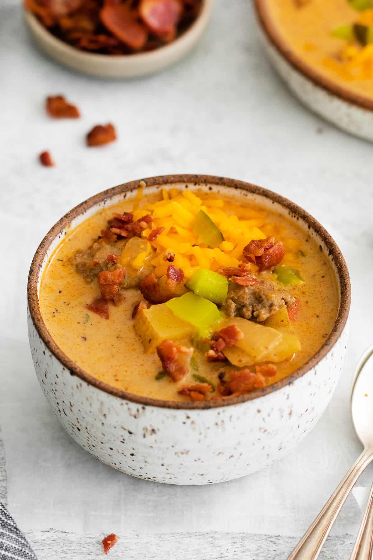 Cheeseburger soup in a bowl.