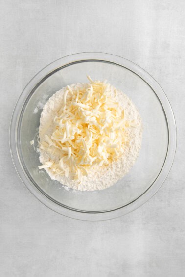 grated butter in flour.