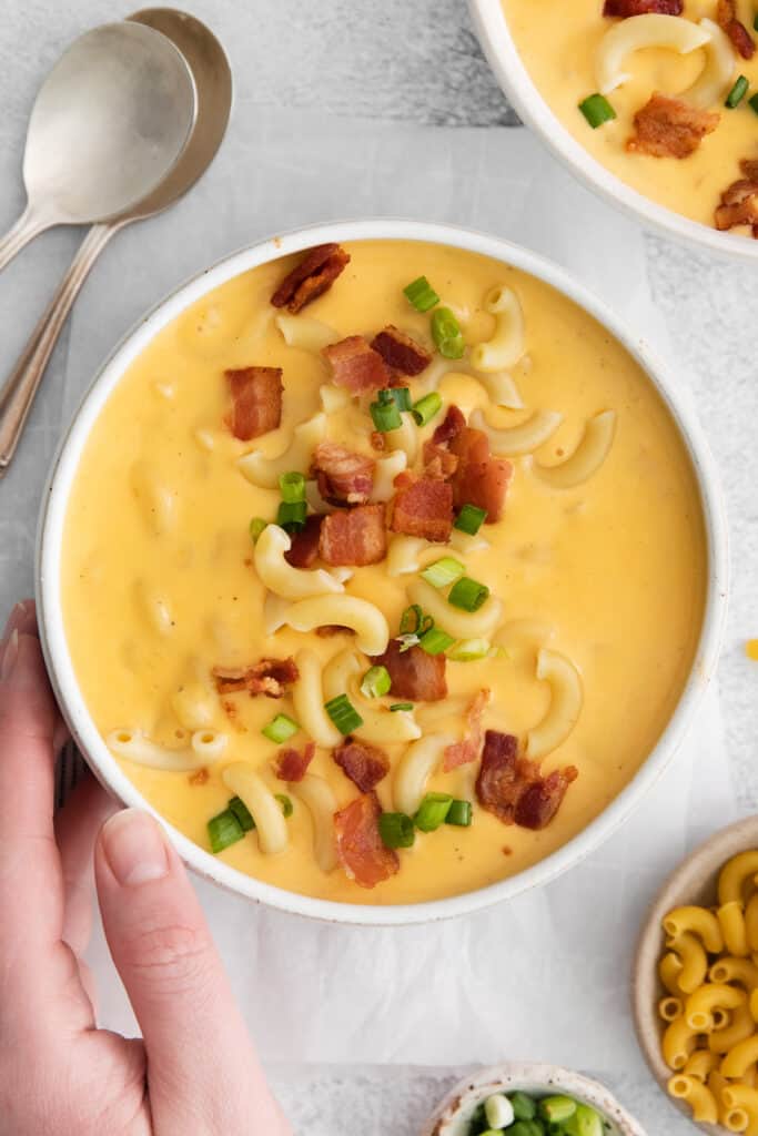 Mac and cheese soup in a bowl.
