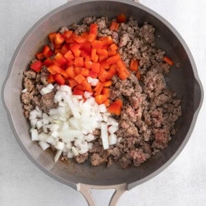 cooking veggies and sausage.