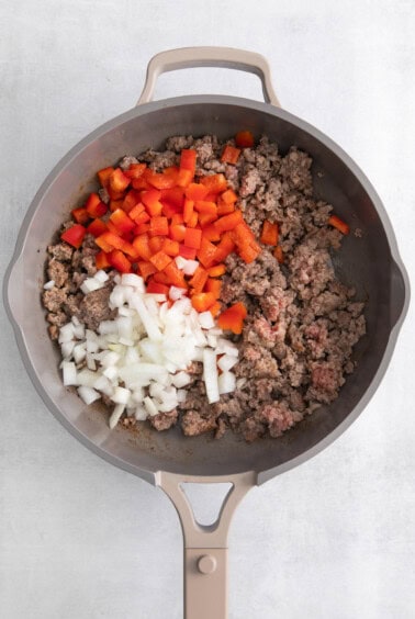 cooking veggies and sausage.