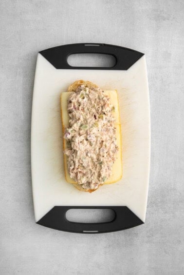 assembling tuna melt.
