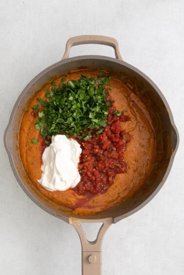 adding ingredients to chorizo.