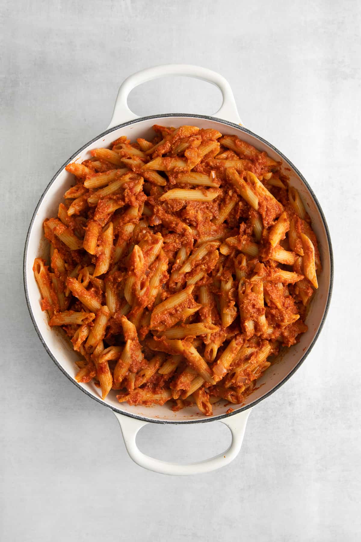 Five cheese marinara sauce on top of penne pasta.