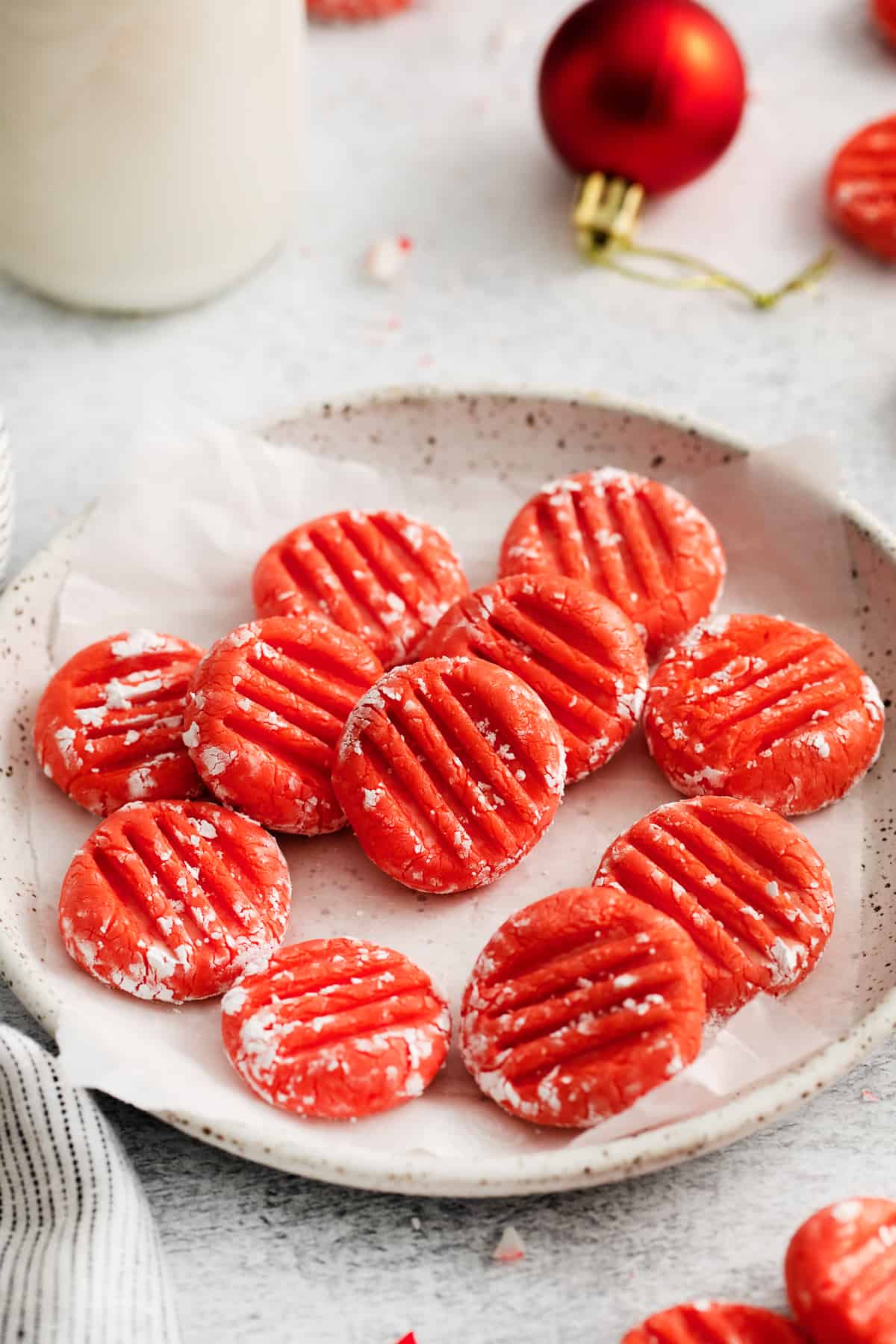 red cream cheese mints on plate.