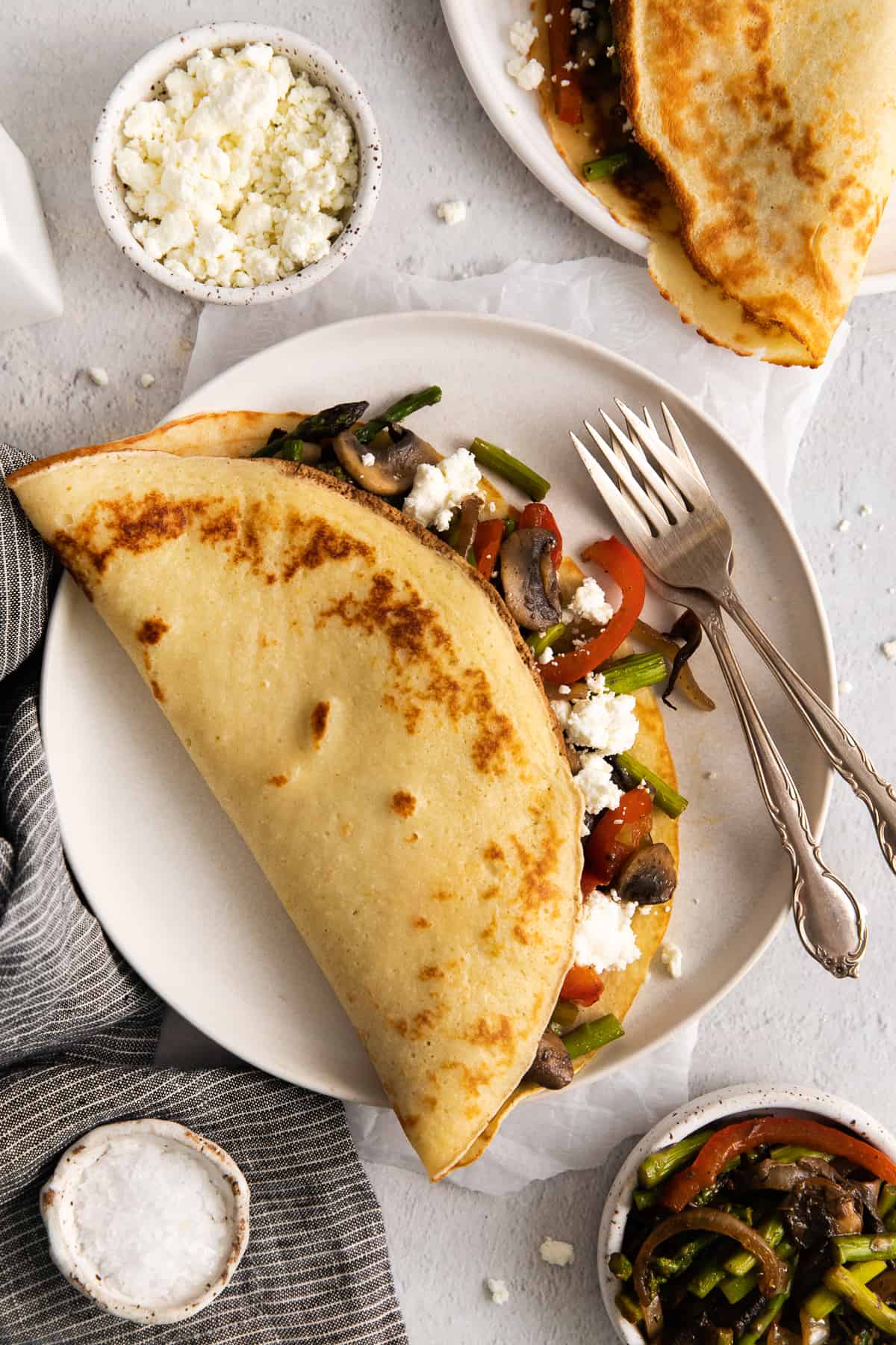 Goat cheese crepe on a plate.
