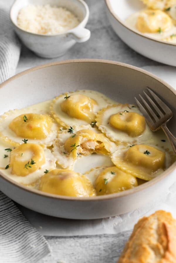 Lobster ravioli with white wine sauce.