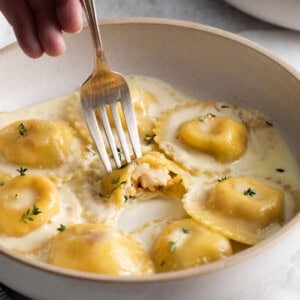 Lobster ravioli with white wine sauce.