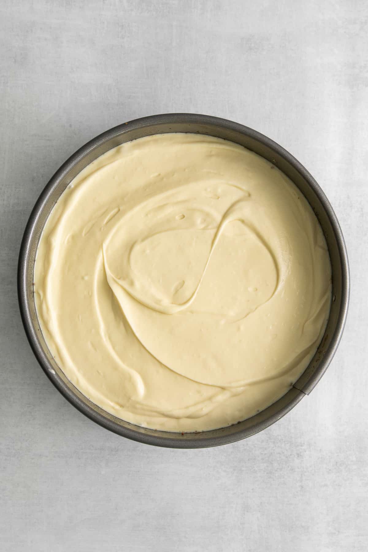 Mascarpone cheesecake batter in a spring form pan.