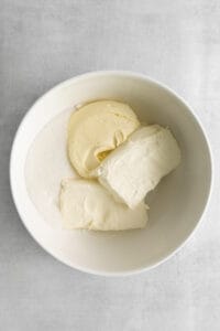 butter and sugar in a white bowl.