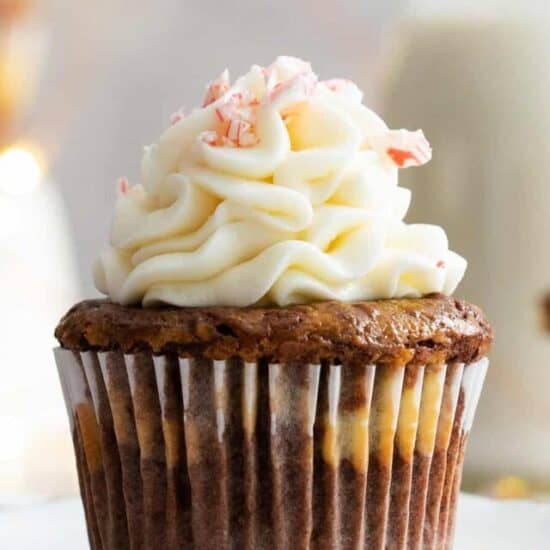 Chocolate cupcake on a plate.