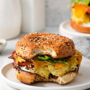 Bagel breakfast sandwich on a plate.