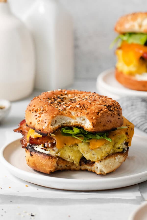 Bagel breakfast sandwich on a plate.