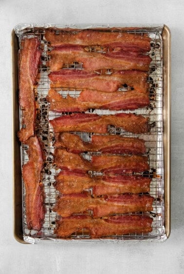 Bacon on a baking sheet.