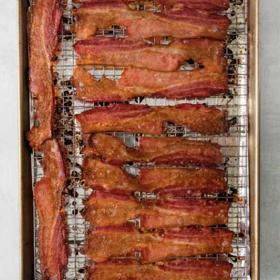 Bacon on a baking sheet.