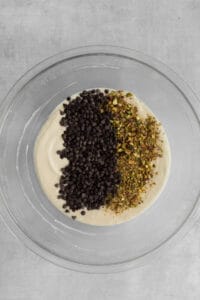 Cannoli dip with chocolate chips and pistachios on top.