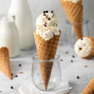 An ice cream cone in a cup.