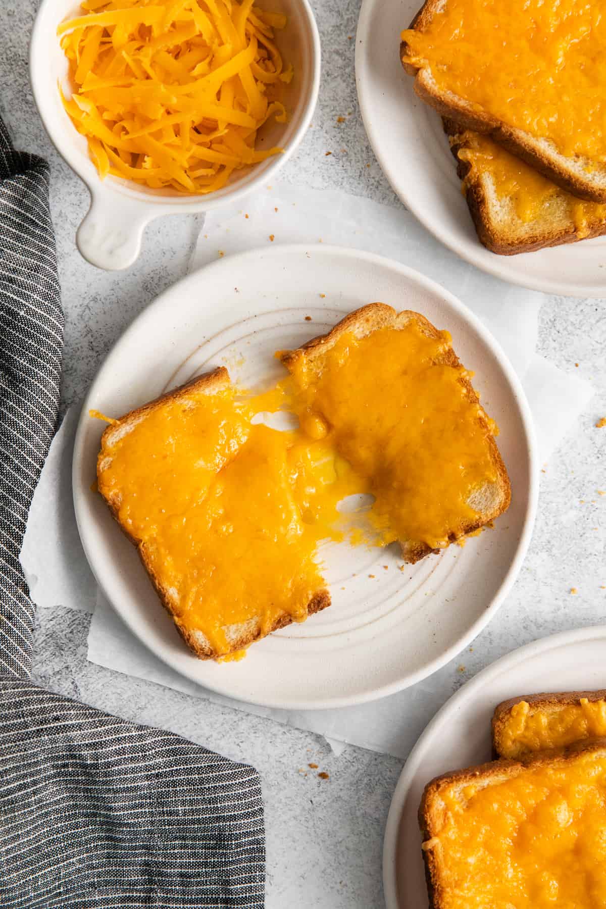 Cheese toast on a plate.