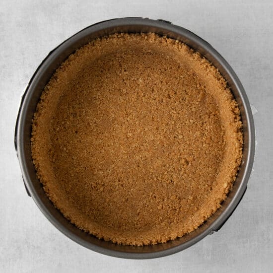 a close up of a pie crust on a table.