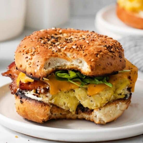 Bagel breakfast sandwich on a plate.