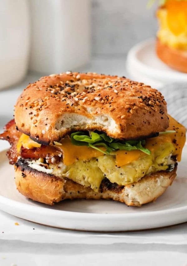Bagel breakfast sandwich on a plate.