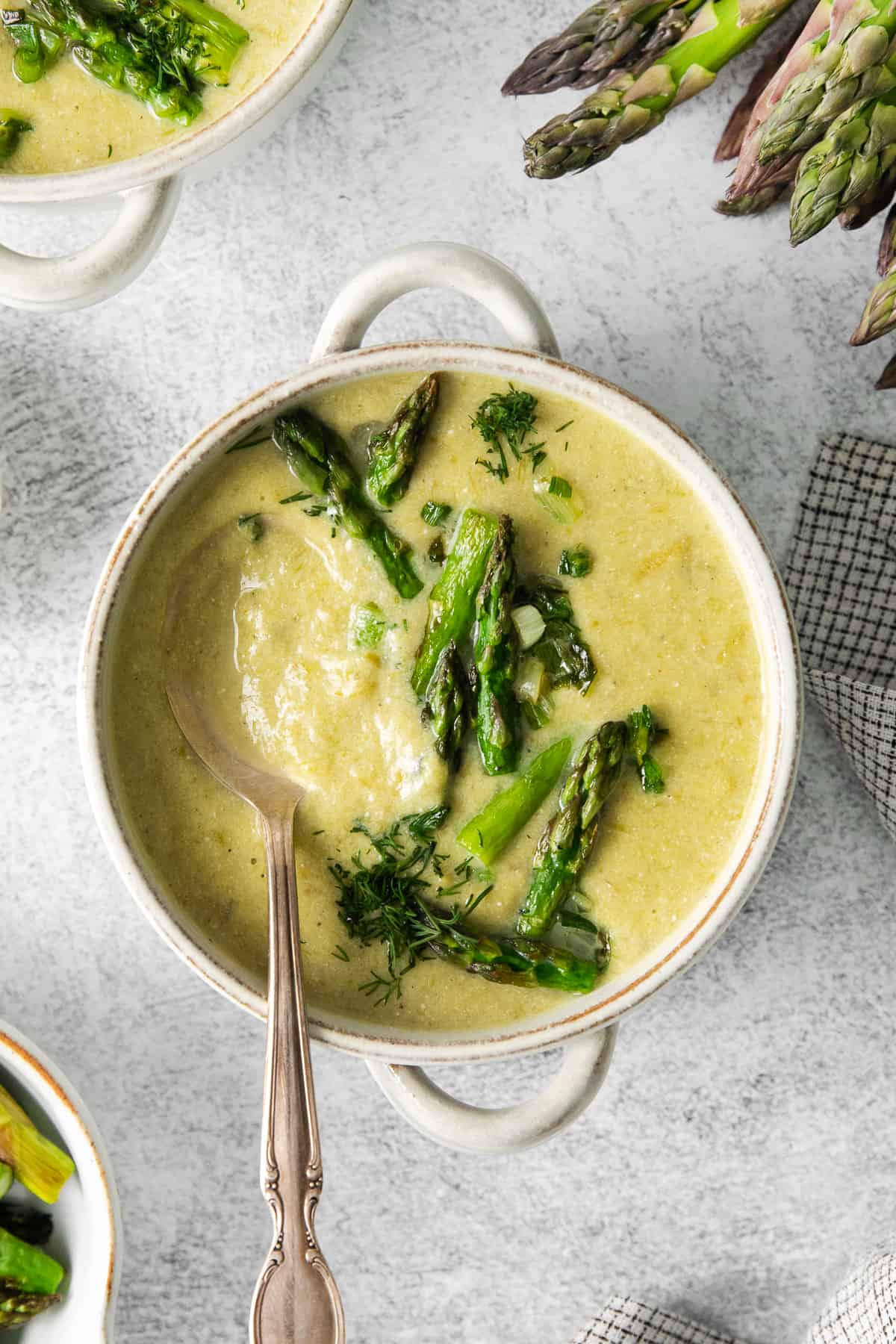 Cream of asparagus soup in a bowl.