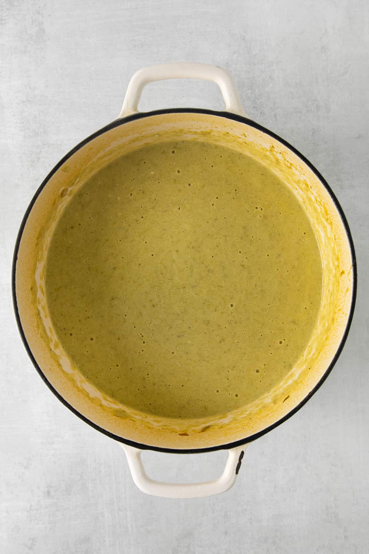 Cream of asparagus soup in a dutch oven.