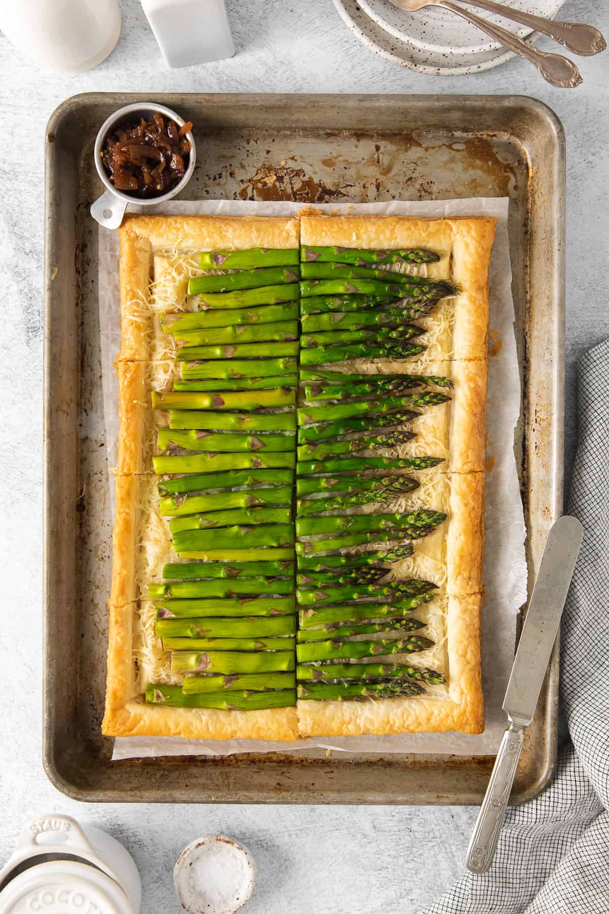 Asparagus tart on a baking sheet.
