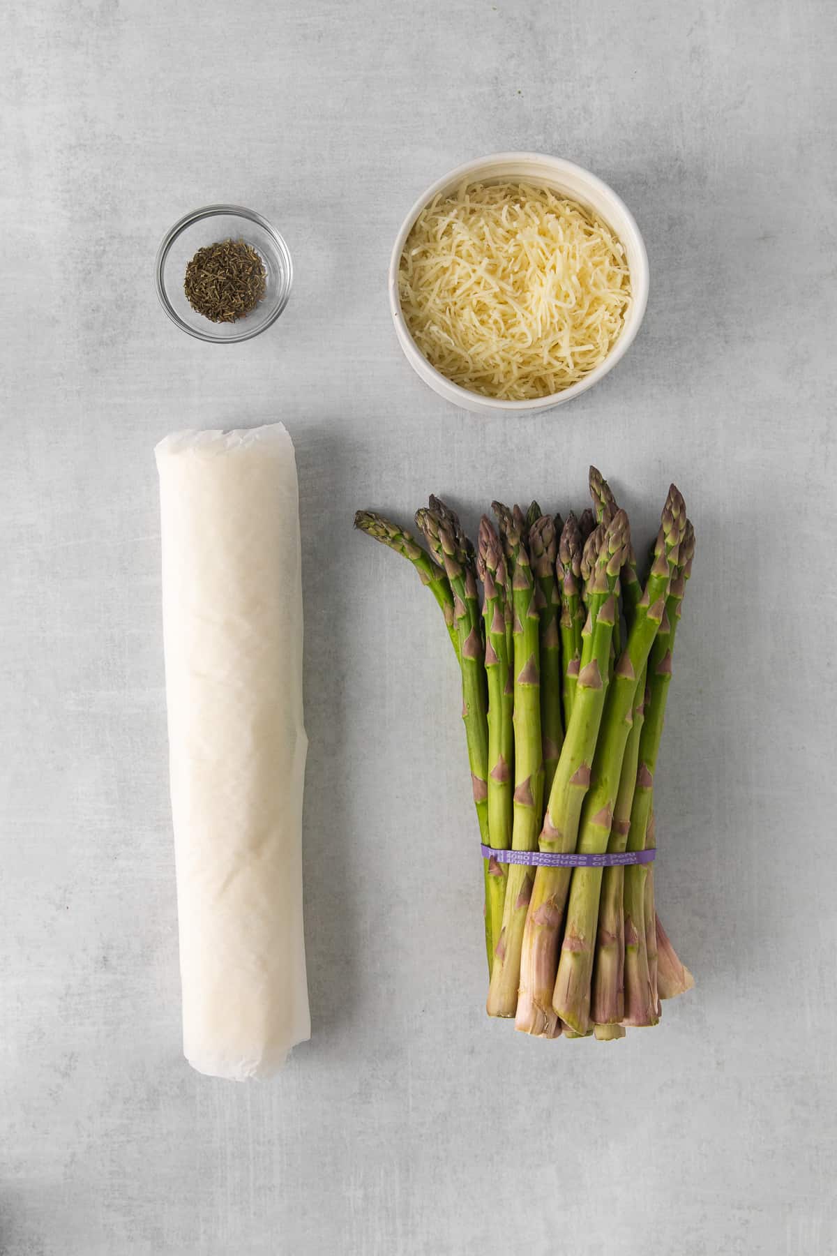 Ingredients for asparagus tart on a counter.