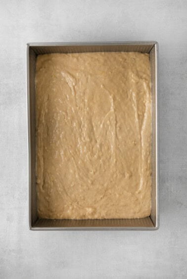 a metal pan with a cake in it.