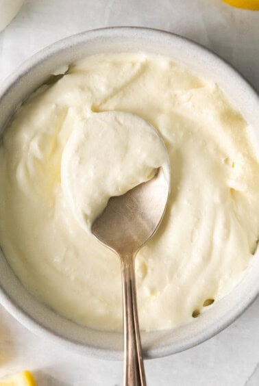 Homemade mascarpone cheese in a bowl.