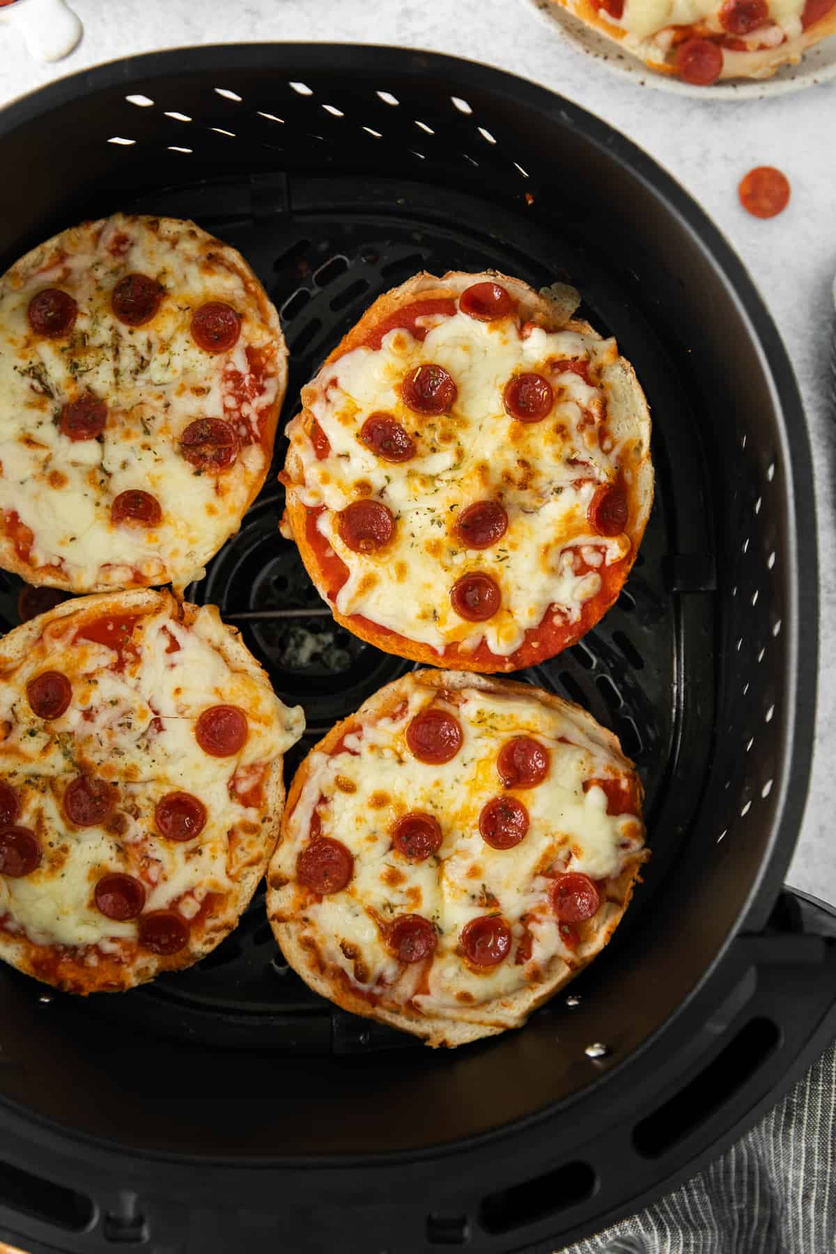 Pizza bagels in an air fryer..